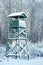 Hunting wooden observation tower in winter weather