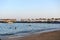 HURGHADA, EGYPT - OCTOBER 14, 2013: Sandy beach full of people is on the Red Sea coastline. Luxury resort hotel on Red Sea beach t