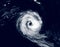 Hurricane eye over sea, view of tropical storm or cyclone from space. Ocean typhoon on satellite photo of Earth