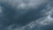 Hurricane gray clouds. Puffy fluffy dark clouds. Cumulus cloudscape real time footage. Autumn or winter sky 4k video