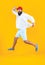 hurrying man deliveryman isolated on yellow. hurrying man deliveryman in studio.