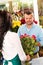 Husband buying roses bouquet romantic flower market