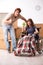 The husband with disabled wife moving to new flat