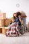 The husband with disabled wife moving to new flat