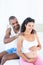 Husband massaging pregnant wife shoulders