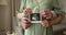 Husband and pregnant wife posing with baby ultrasound image closeup