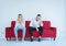 Husband quarrel with wife conflict and boring couple on red sofa,Negative emotions,Copy space for text,White background