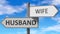 Husband and wife as a choice - pictured as words Husband, wife on road signs to show that when a person makes decision he can