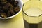 Hushaf - date milk, traditional Ramadan dish, cooking, ingredients, glass with date milk - khushaf and dish with dates are on a