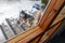 Husky dog on the street in winter lies on the porch. The dog does not live at home, street maintenance of the pet