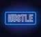 Hustle neon text on brick wall background.