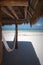 A hut and hammock on the beach