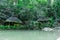 Hut at Kathu waterfall water gently flowing down the rocks Patong Phuket Thailand Asia