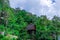 Hut at Kathu waterfall water gently flowing down the rocks Patong Phuket Thailand Asia