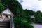 Hut at Kathu waterfall water gently flowing down the rocks Patong Phuket Thailand Asia