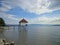 a hut in a lake on the bridge