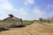 Hut And Path Through Beautiful Landscpae Under Blue Sky