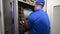 HVAC Technician Installing a Blower Motor Close up