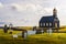 Hvalsneskirkja church with a cemetery in Iceland