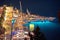 Hvar bay and yachting harbor aerial panoramic evening view