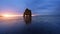 Hvitserkur is a spectacular rock in the sea on the Northern coast of Iceland. On this photo Hvitserkur reflects in the