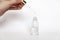 Hyaluronic acid drop falls from cosmetic pipette on white background, Dropper glass Bottle Mock-Up