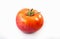 Hybrid of apple and tomato on a white background.