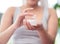 Hydrate your way to supple,smooth skin. Shot of woman holding a jar of cream.