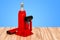 Hydraulic Bottle Jack on the wooden table, 3D rendering