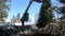 Hydraulic crane machine log forwarder unpacking logs