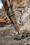 Hydraulic crusher excavator backhoe machinery working on site demolition