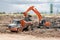 Hydraulic Excavator, Articulated Dump Truck Landfill Clearing