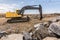 Hydraulic hammer drilling stone in a mine