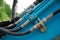 Hydraulic hose connections on industrial equipment