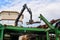 Hydraulic manipulator controls the position of the logs on the feed conveyor in a modern sawmill