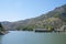 Hydro electric station. Turquoise lake at the foot of the mountain. Water reservoir of El Chorro.