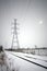 Hydro lines along train tracks in winter