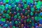 Hydrogel Orbeez background.Blue green orbiz balls in water.Hydrogel balls for decoration, gardening and air humidifier