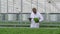 Hydroponic farm industry of man agronomist examining green lettuce and working with tablet spbd.