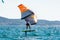 Hyeres, Almanarre beach, France, July 10, 2021. Extreem water sport - wing foil, kite surfing, wind surfindg, windy day on