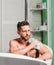 Hygiene and health. Morning shower. man wash muscular body with foam sponge. macho man washing in bath. personal care