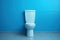 Hygienic Ceramic toilet blue wall. Generate Ai