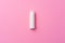 Hygienic female tampon on a pink background