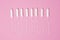 hygienic feminine tampons for menstruation on a pink background