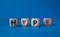 Hype symbol. Concept word Hype on wooden cubes. Beautiful blue background. Business and Hype concept. Copy space