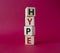 Hype symbol. Concept word Hype on wooden cubes. Beautiful red background. Business and Hype concept. Copy space