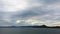 Hyper lapse, timelapse of a boat traveling in Japan island ocean with fast moving cloud and waves.