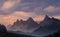 Hyper-realistic illustration of cloudy mountains with sunset sky in background