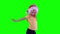 Hyperactive girl dance. 4 years old child with Christmas hat. Chroma key