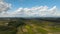 Hyperlapse: Clouds and sun move across autumn rice fields in country